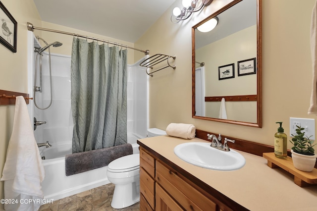 37905 Hall Rd, Sterling, AK 99672 - bathroom featuring vanity, shower / tub combo, and stone finish floors