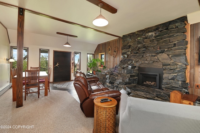37905 Hall Rd, Sterling, AK 99672 - living area featuring carpet flooring, a stone fireplace, and lofted ceiling