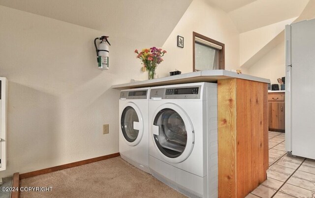 37905 Hall Rd, Sterling, AK 99672 - washroom featuring washing machine and dryer and baseboards