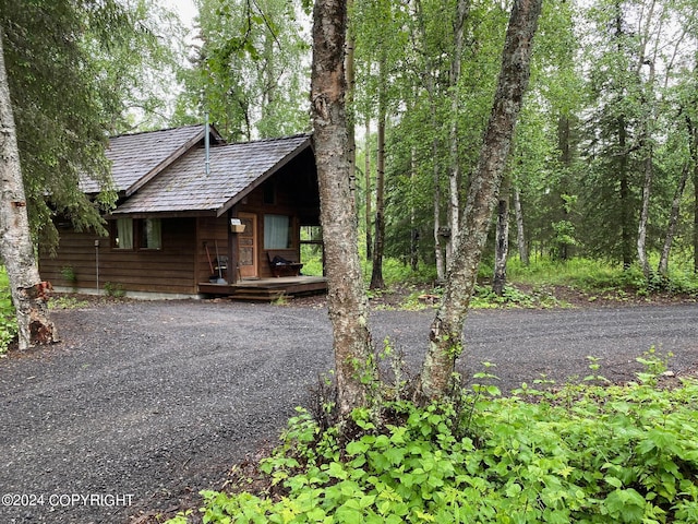 37905 Hall Rd, Sterling, AK 99672 - view of front facade with covered porch and gravel driveway