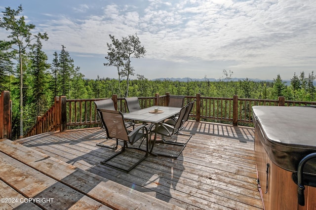 37905 Hall Rd, Sterling, AK 99672 - wooden terrace with outdoor dining space and a view of trees