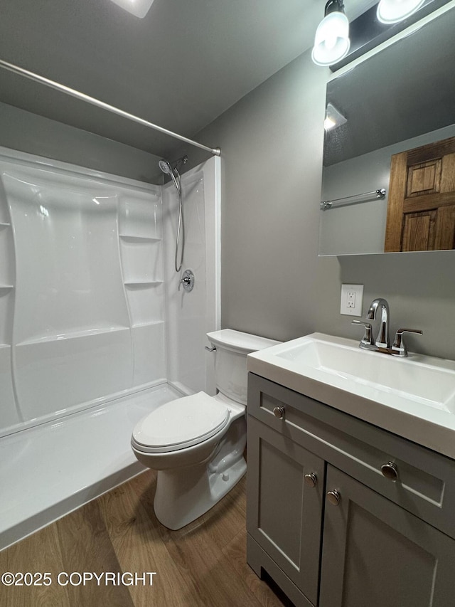 37905 Hall Rd, Sterling, AK 99672 - full bathroom with a shower, vanity, and wood finished floors