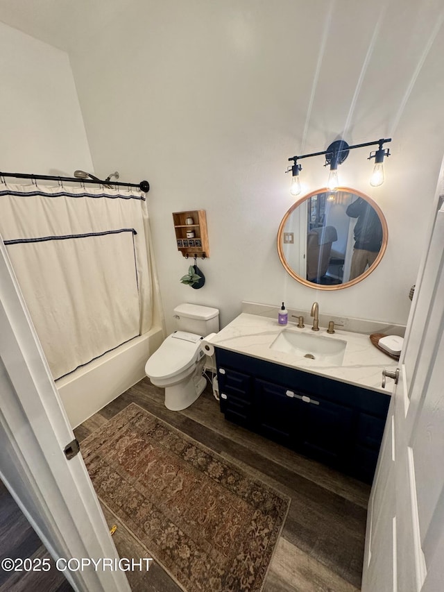 6780 W Blondell Dr, Wasilla, AK 99623 - full bath featuring vanity, wood finished floors, and shower / tub combo with curtain