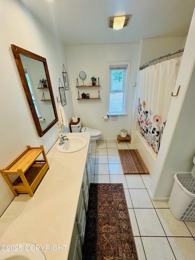 6780 W Blondell Dr, Wasilla, AK 99623 - full bath with vanity, tile patterned floors, and shower / bathtub combination with curtain