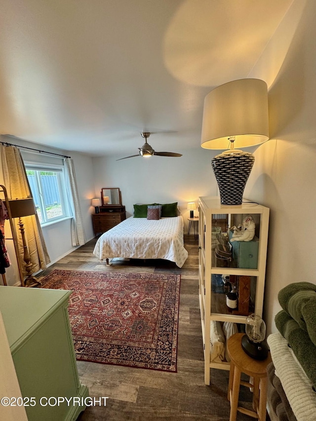 6780 W Blondell Dr, Wasilla, AK 99623 - bedroom featuring wood finished floors and a ceiling fan