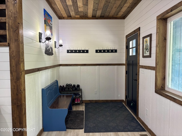 11157 S Berut Rd, Palmer, AK 99645 - doorway to outside with wood walls and wood ceiling
