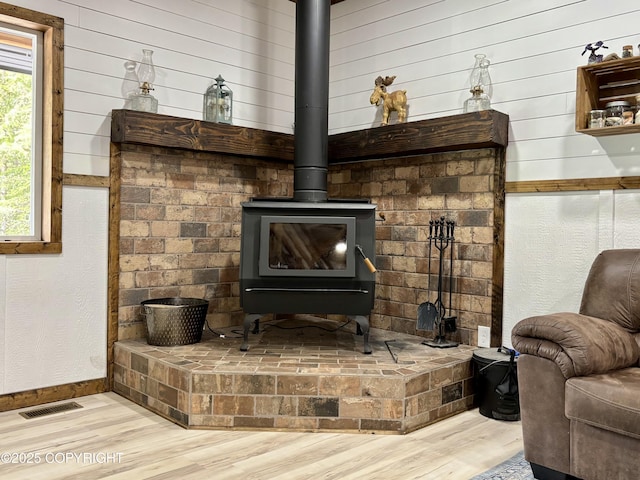 11157 S Berut Rd, Palmer, AK 99645 - detailed view of wood finished floors and a wood stove