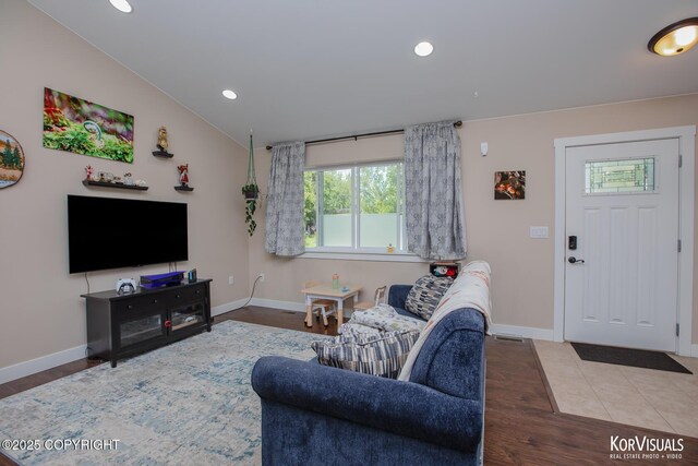 1524 N Little Susitna Dr, Wasilla, AK 99654 - living room featuring wood finished floors, recessed lighting, and lofted ceiling