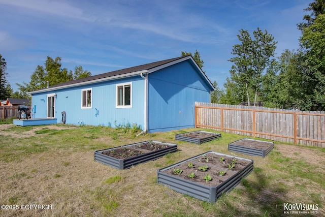 1524 N Little Susitna Dr, Wasilla, AK 99654 - rear view of property with a garden