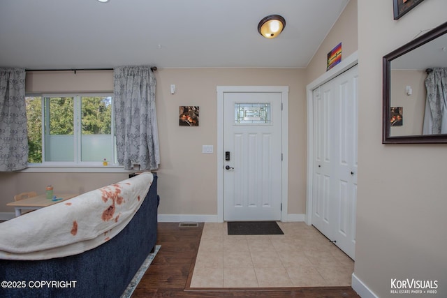 1524 N Little Susitna Dr, Wasilla, AK 99654 - foyer entrance featuring healthy amount of natural light and wood finished floors