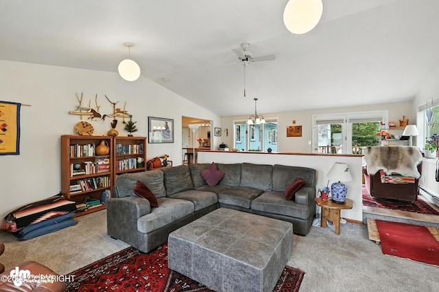222 Crest Dr, Soldotna, AK 99669 - carpeted living area with ceiling fan, lofted ceiling, and a chandelier