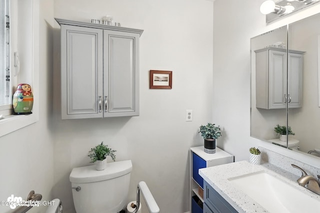 222 Crest Dr, Soldotna, AK 99669 - half bathroom featuring toilet and vanity