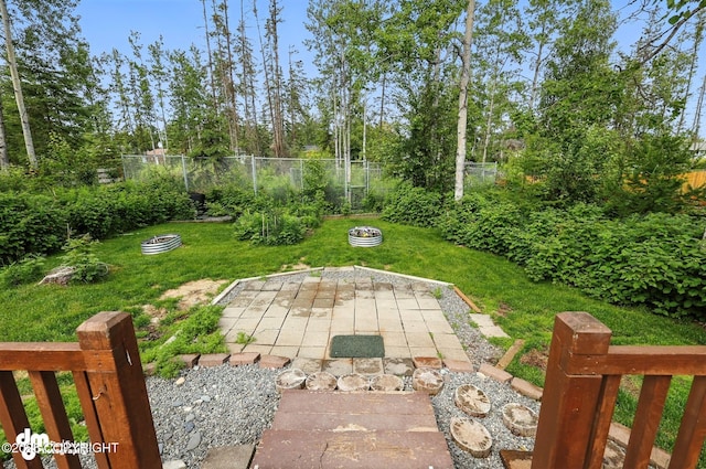 222 Crest Dr, Soldotna, AK 99669 - fenced backyard with a patio