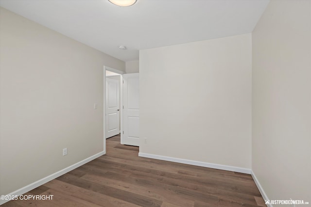 3031 Bennett Ave, Anchorage, AK 99517 - unfurnished room with wood finished floors and a smoke detector