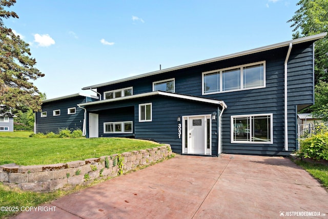 3031 Bennett Ave, Anchorage, AK 99517 - view of front of house featuring a patio and a front yard