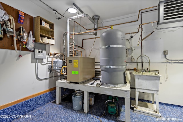 3031 Bennett Ave, Anchorage, AK 99517 - utility room featuring a central vacuum unit and electric panel