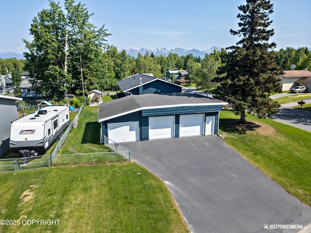 3031 Bennett Ave, Anchorage, AK 99517 - view of front of house with driveway, a mountain view, and a garage