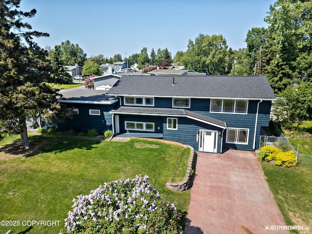 3031 Bennett Ave, Anchorage, AK 99517 - view of front of property featuring concrete driveway and a front lawn