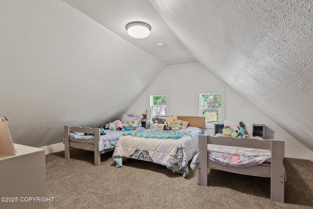 38835 Pinewood Ave, Sterling, AK 99672 - carpeted bedroom with a textured ceiling and vaulted ceiling