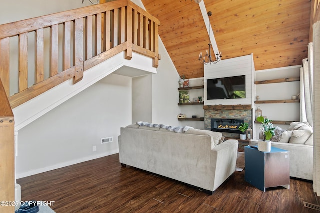 38835 Pinewood Ave, Sterling, AK 99672 - living room featuring a fireplace, wood finished floors, wood ceiling, a chandelier, and high vaulted ceiling