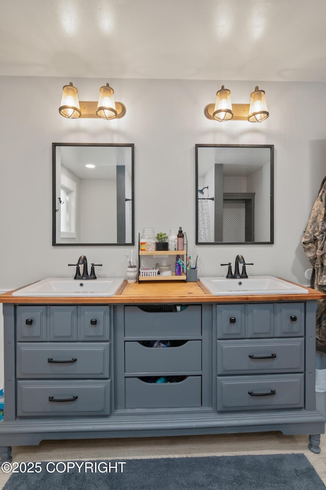 38835 Pinewood Ave, Sterling, AK 99672 - bathroom featuring double vanity