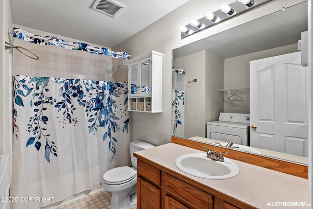 1220 S Felton St, Palmer, AK 99645 - full bath featuring washer / dryer, vanity, shower / bath combination with curtain, and tile patterned floors