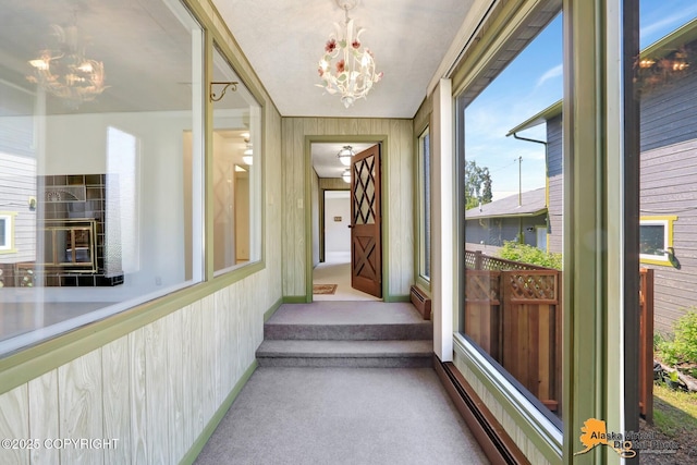 1110 F St, Anchorage, AK 99501 - unfurnished sunroom featuring a chandelier and baseboard heating