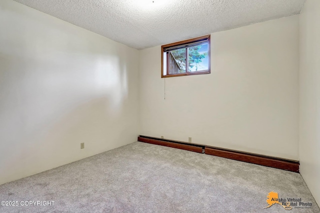 1110 F St, Anchorage, AK 99501 - carpeted empty room with a textured ceiling
