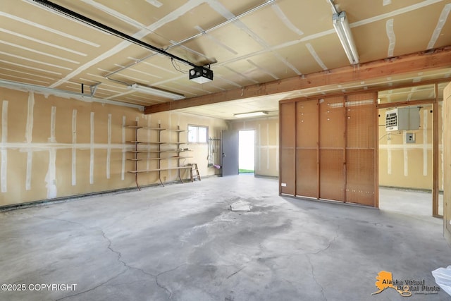 1110 F St, Anchorage, AK 99501 - garage featuring a garage door opener