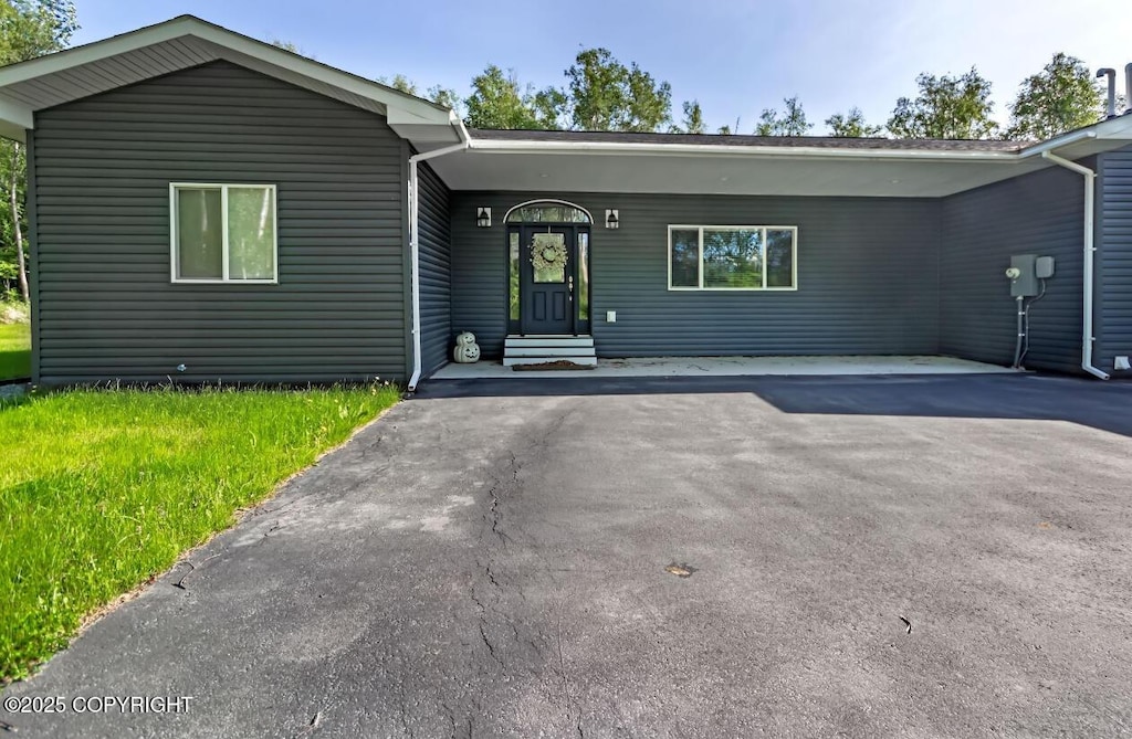 4853 N Riverstone Cir, Palmer, AK 99645 - single story home featuring asphalt driveway