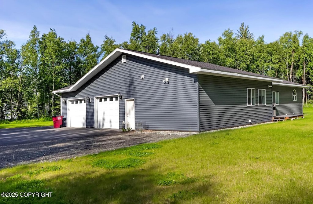 4853 N Riverstone Cir, Palmer, AK 99645 - view of home's exterior with a yard and a detached garage