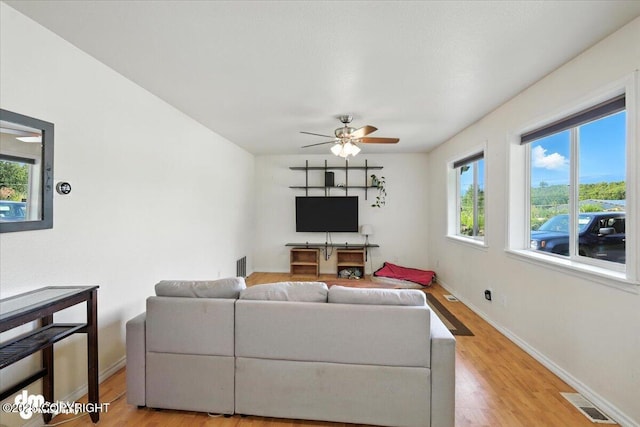 600 E Strathclyde Ln, Wasilla, AK 99654 - living area with ceiling fan and light wood finished floors