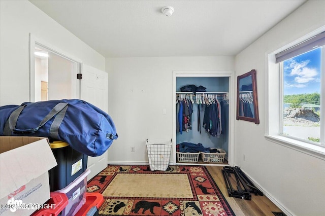 600 E Strathclyde Ln, Wasilla, AK 99654 - laundry room with wood finished floors and baseboards