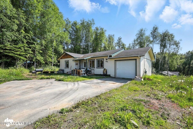 600 E Strathclyde Ln, Wasilla, AK 99654 - ranch-style house featuring an attached garage and driveway