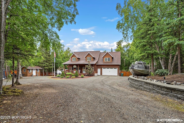4051 Twilight Ln, Anchorage, AK 99516 - view of front of house featuring driveway and covered porch