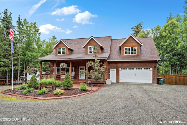 4051 Twilight Ln, Anchorage, AK 99516 - view of front of home featuring covered porch, driveway, an attached garage, and roof with shingles