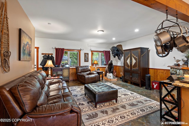 4051 Twilight Ln, Anchorage, AK 99516 - living area with stone tile flooring, wainscoting, wooden walls, and recessed lighting