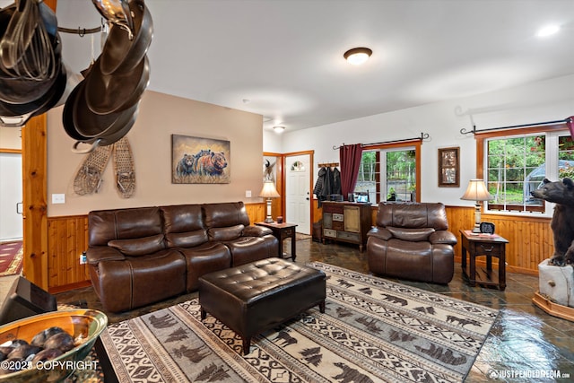 4051 Twilight Ln, Anchorage, AK 99516 - living room with a wainscoted wall, wood walls, and stone finish flooring
