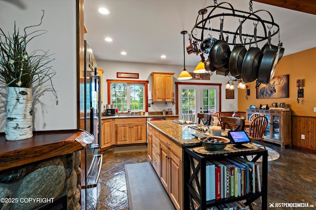 4051 Twilight Ln, Anchorage, AK 99516 - kitchen with stone tile floors, recessed lighting, a center island, stone counters, and wainscoting