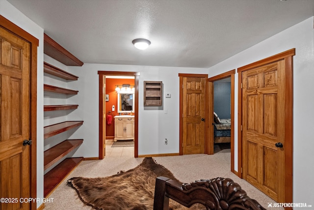 4051 Twilight Ln, Anchorage, AK 99516 - carpeted bedroom featuring a textured ceiling and ensuite bathroom