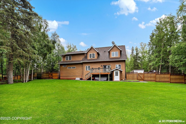 4051 Twilight Ln, Anchorage, AK 99516 - back of property with stairway, a deck, a fenced backyard, and a shed