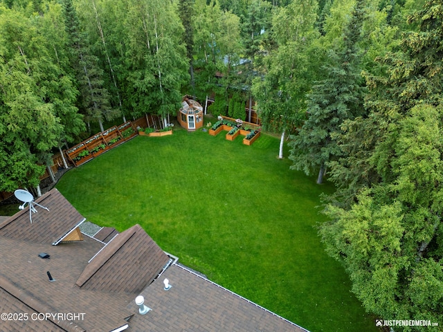 4051 Twilight Ln, Anchorage, AK 99516 - fenced backyard with a shed and a view of trees