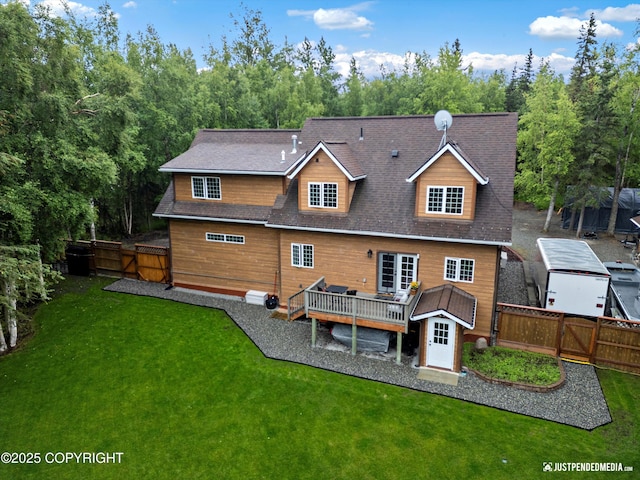 4051 Twilight Ln, Anchorage, AK 99516 - back of property with a deck, a fenced backyard, and a shingled roof