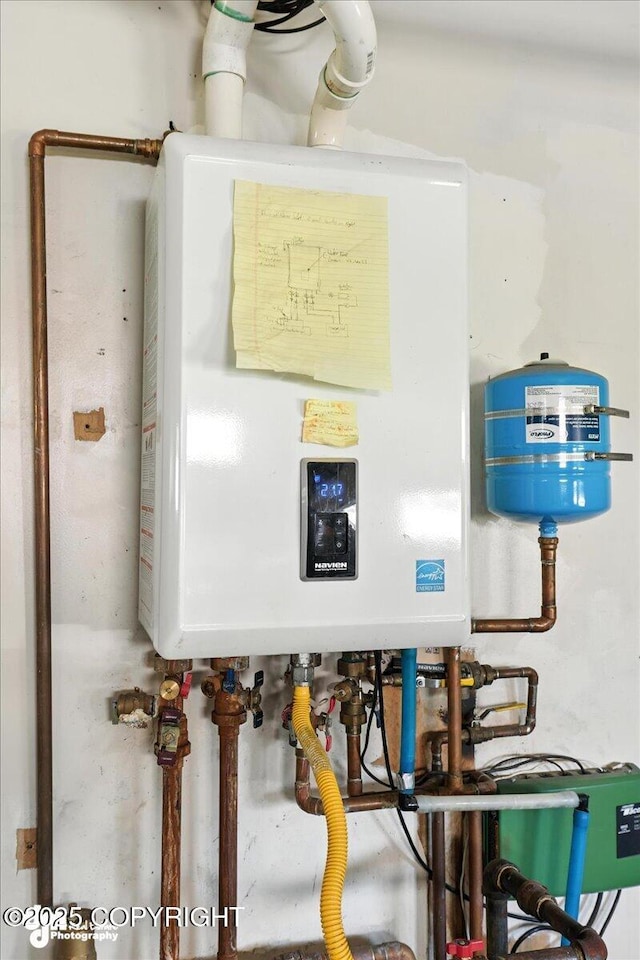 275 S Hoyt St, Anchorage, AK 99508 - utility room with water heater