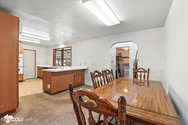275 S Hoyt St, Anchorage, AK 99508 - dining area with arched walkways and light colored carpet