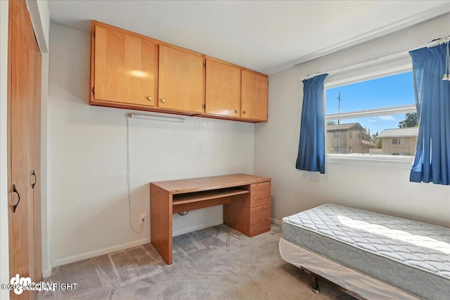 275 S Hoyt St, Anchorage, AK 99508 - unfurnished bedroom with light colored carpet and baseboards