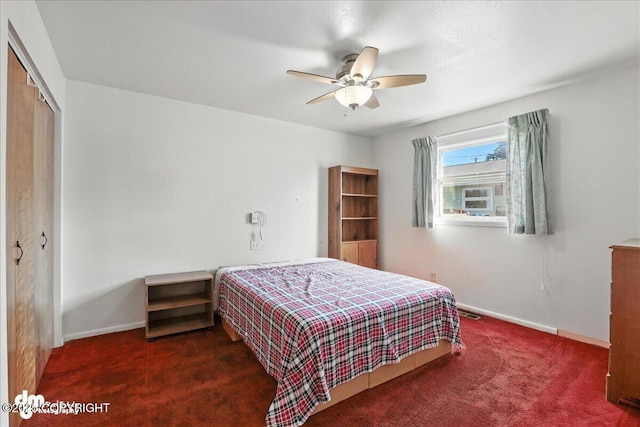 275 S Hoyt St, Anchorage, AK 99508 - carpeted bedroom with a closet and a ceiling fan