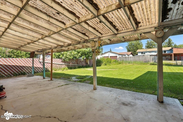 275 S Hoyt St, Anchorage, AK 99508 - fenced backyard featuring a patio area