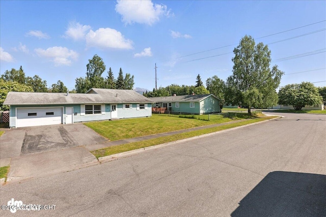 275 S Hoyt St, Anchorage, AK 99508 - single story home featuring an attached garage and asphalt driveway