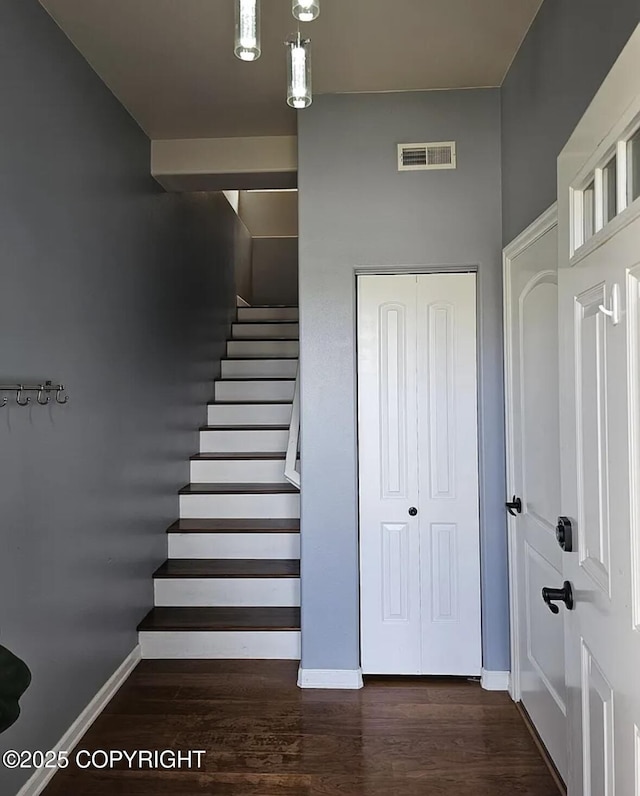 12297 Vista Ridge Loop # 55, Eagle River, AK 99577 - stairway with baseboards and wood finished floors